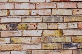 A solid masonry wall